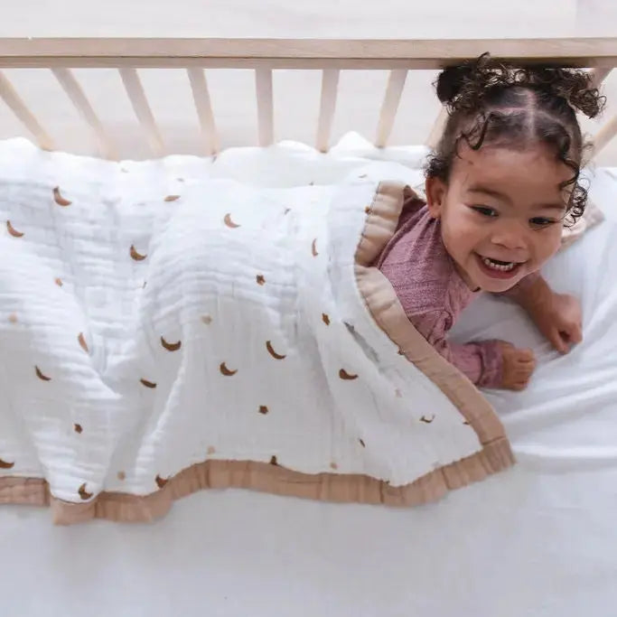 baby wrapped in breathable Snuggle Buds blanket