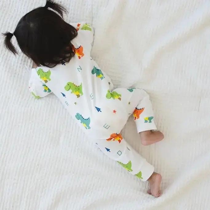 Dino Dreams Zipped Onesie (0–12 Months) – 100% Cotton Muslin Baby Sleepwear Snuggle Buds
