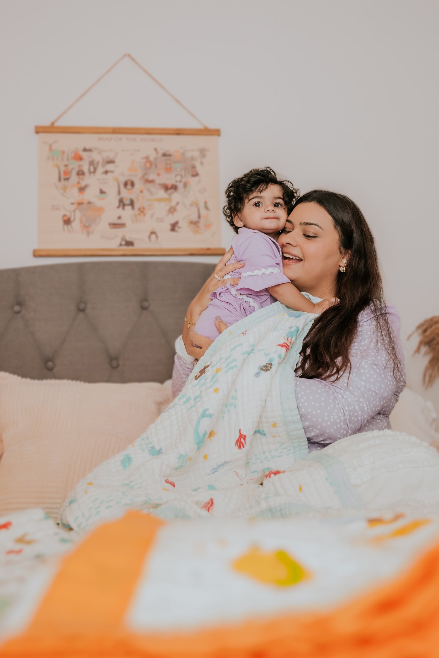 Mother holding her baby in the blanket