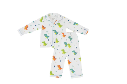 Children's pajama set with dinosaur pattern on a white background
