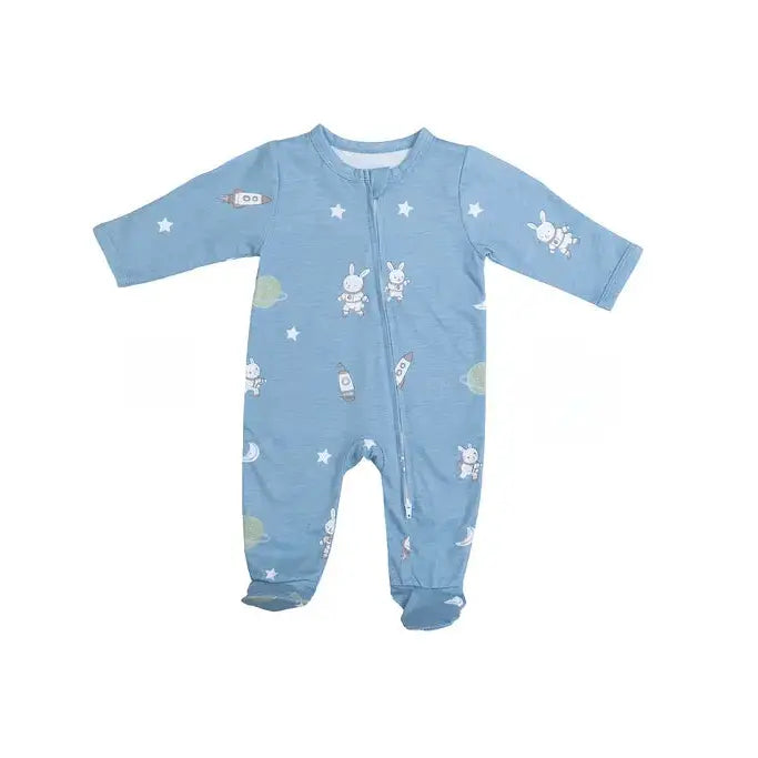A baby's long-sleeve footed sleeper in heathered light blue, featuring a playful space-themed print with white stars, cartoon bunnies, rockets, and small planets.