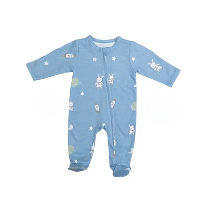 A baby's long-sleeve footed sleeper in heathered light blue, featuring a playful space-themed print with white stars, cartoon bunnies, rockets, and small planets.